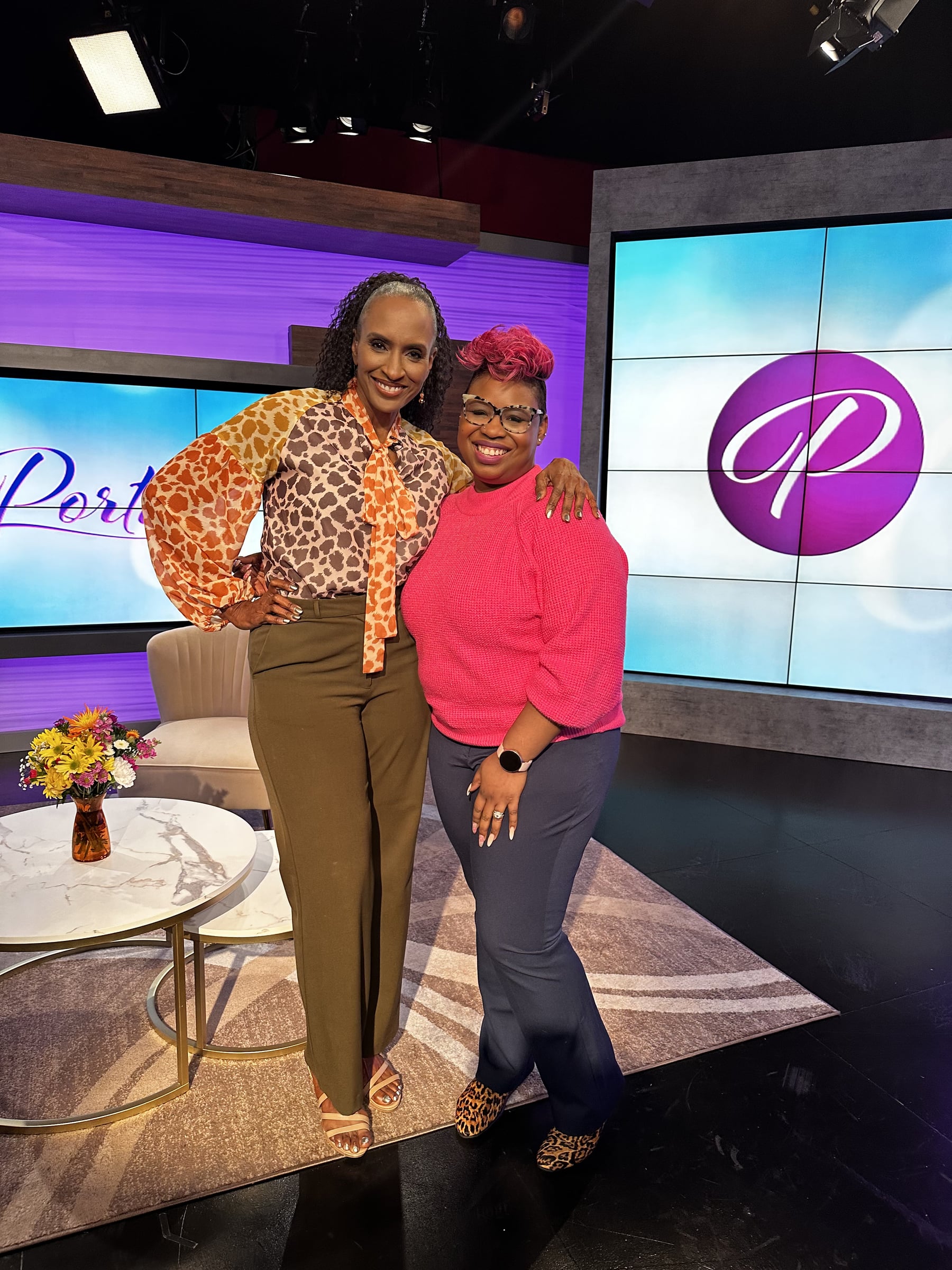 LaShawn Davis with Portia on a television set