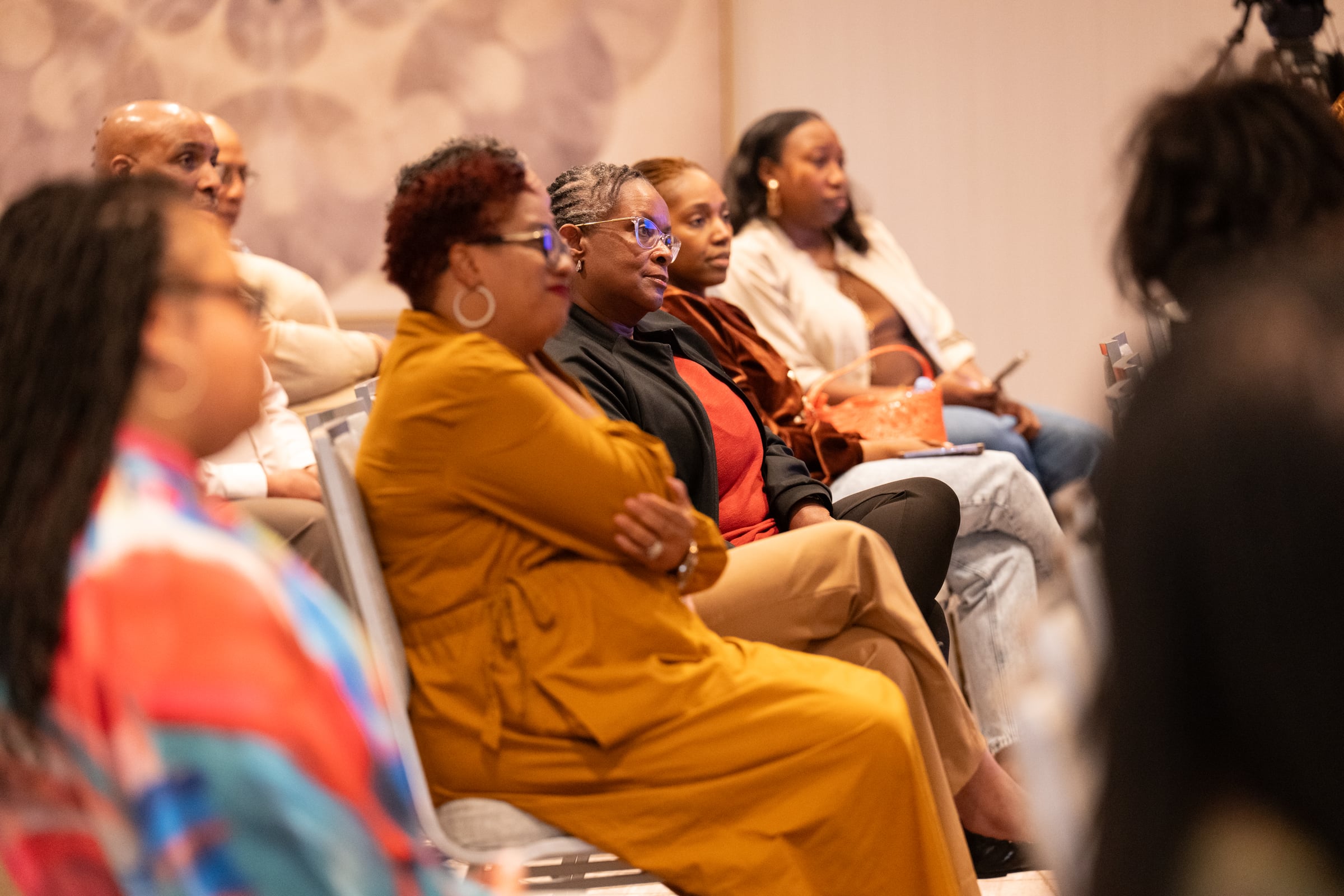 Audience listening at a LaShawn Davis speaking event